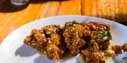 Crispy chicken with passionfruit and pineapple sauce