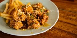 Crispy chicken with passionfruit and pineapple sauce